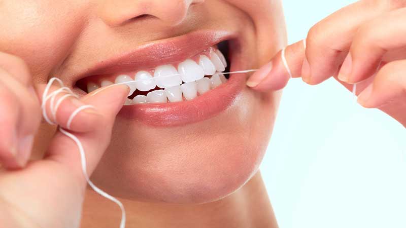 روزانه نخ دندان بکشید - مراقبت از ایمپلنت دندان